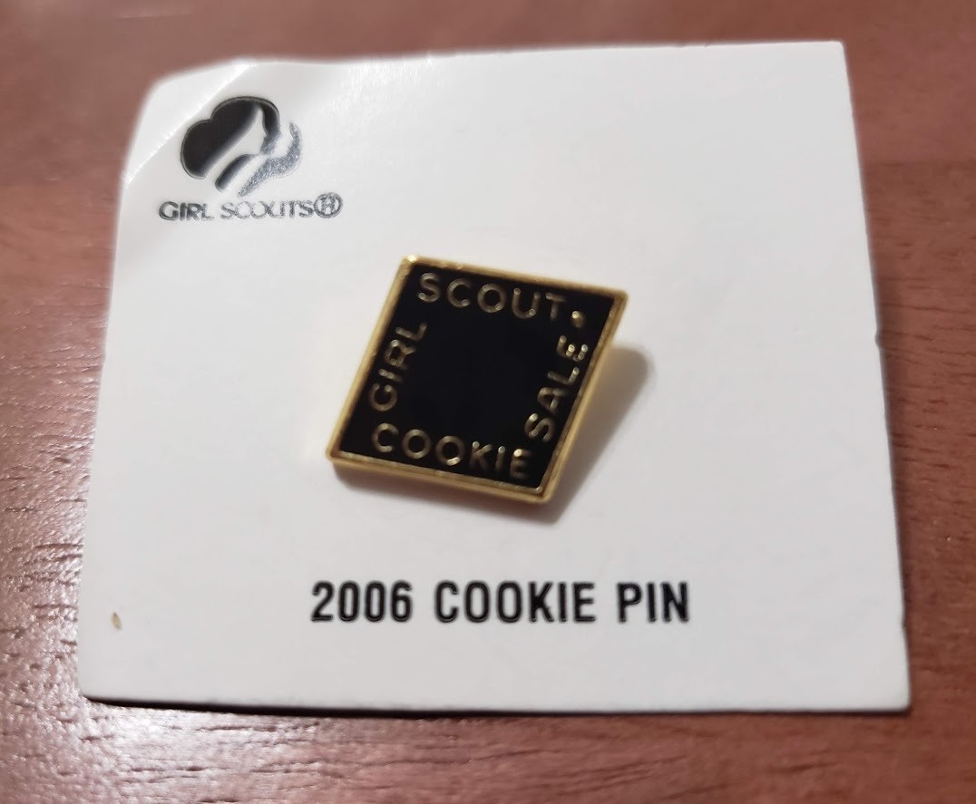 2006 Black Metal Cookie Pin