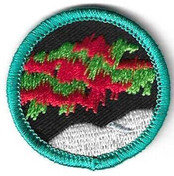 Northern Lights GS of Alaska Council own Junior Badge (Original-turquoise-green border)
