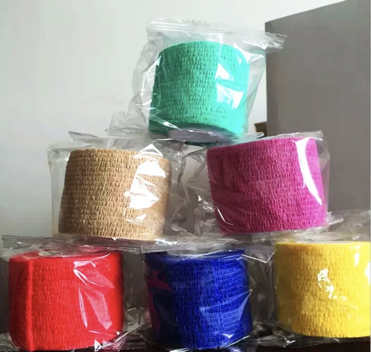 Selvklebende elastisk bind til PMU