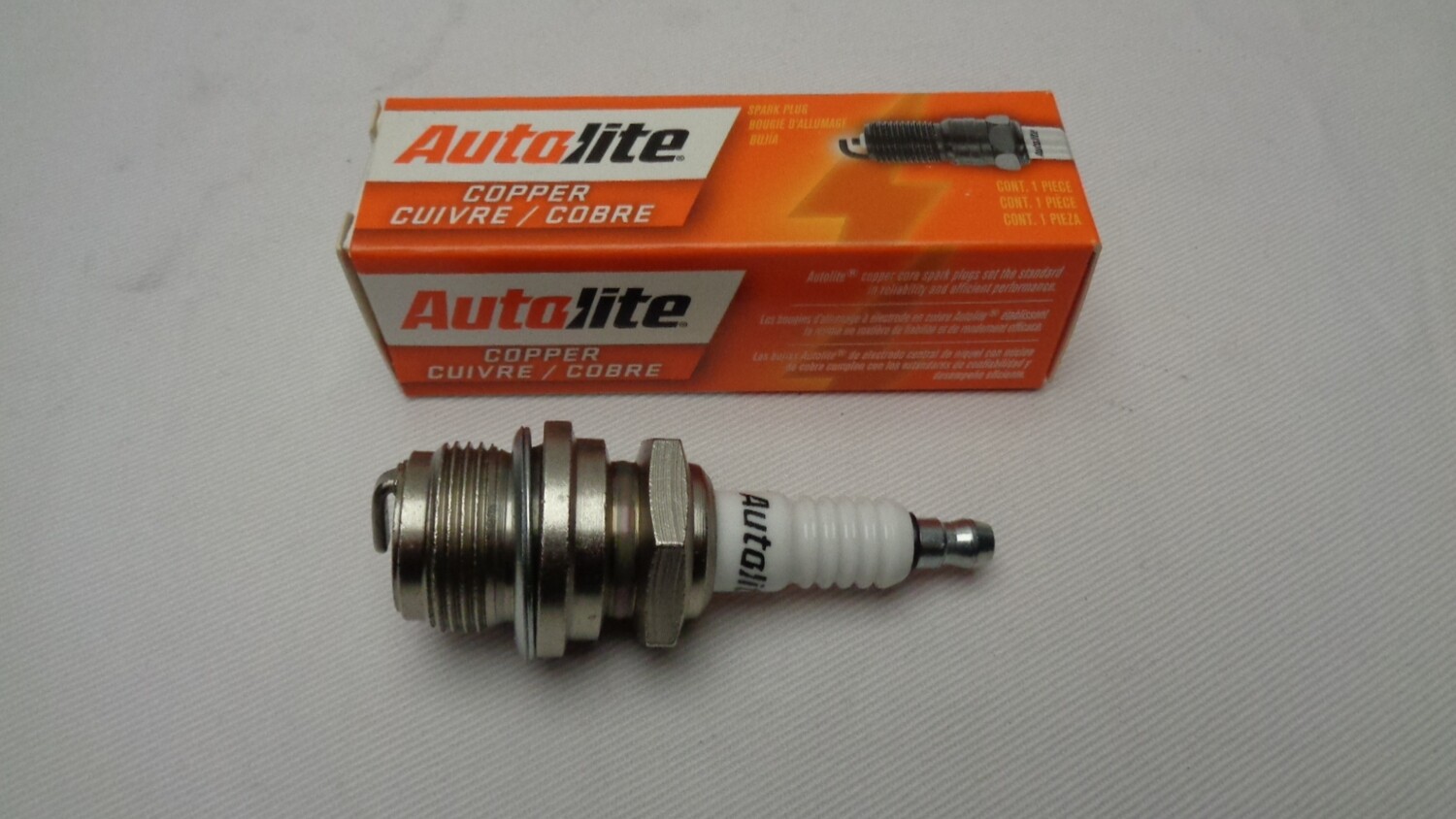 Auto-lite Tennplugg for D-motor