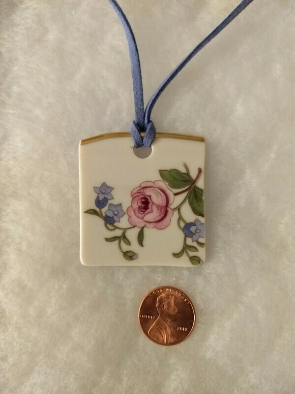 Pink rose, blue suede cord