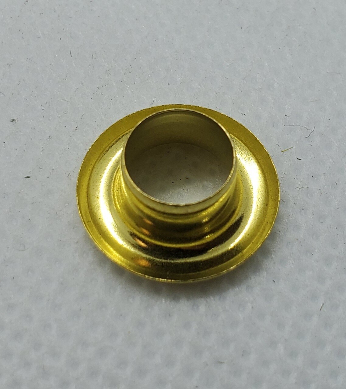 GROMMET, BRASS