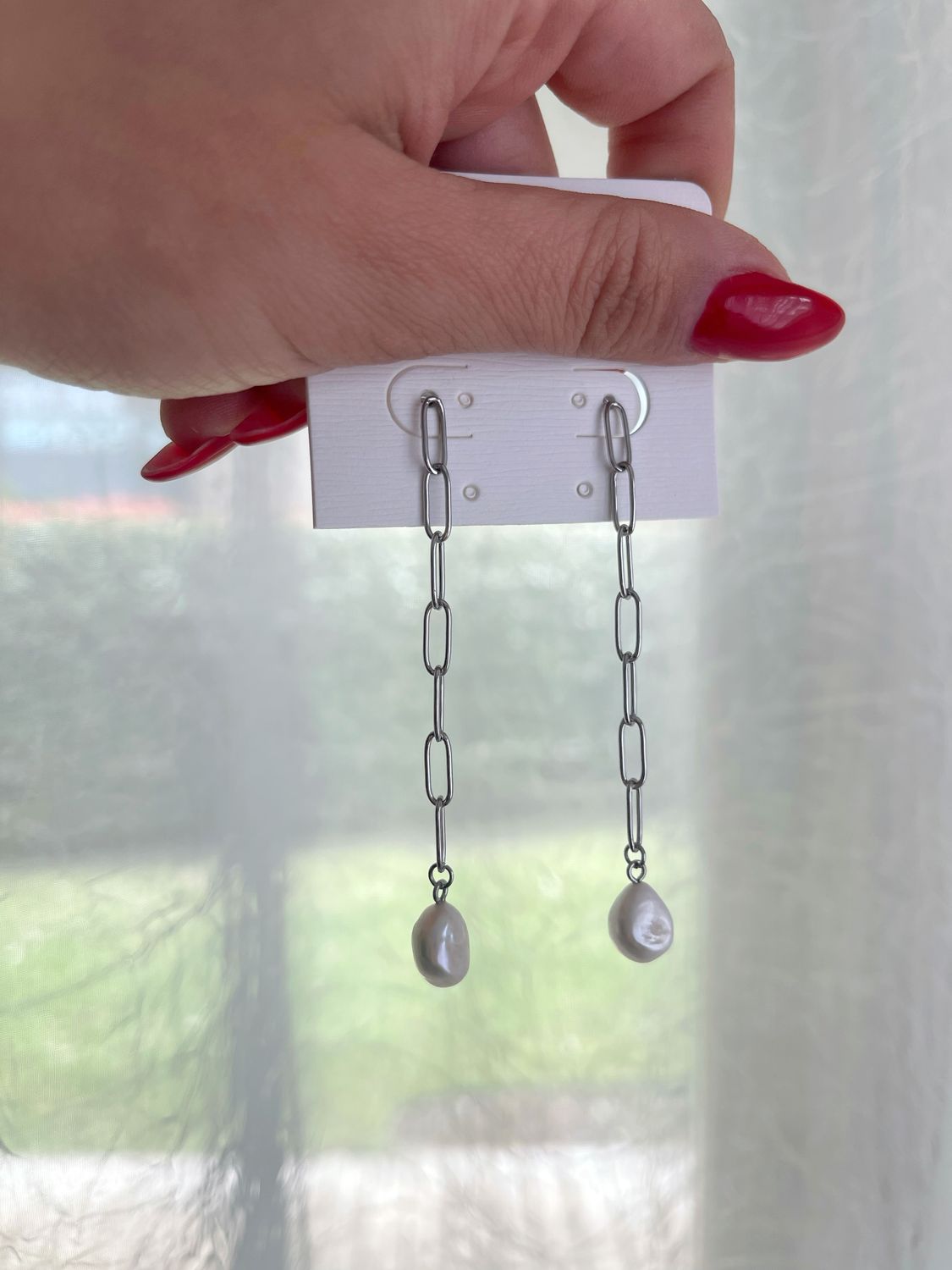 Orecchini pendenti con perle