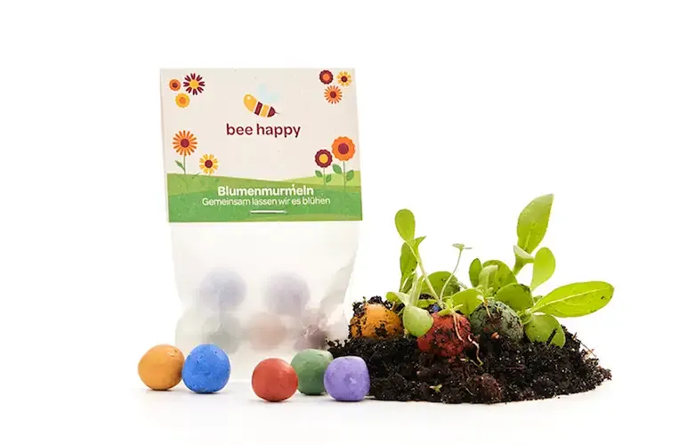Bunte Seedbombs / Saatkugeln in Pergaminbeutel mit Logo als Werbemittel