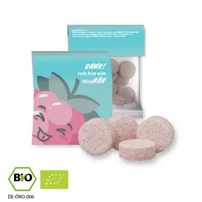 Bio-Himbeer-Drops in kompostierbarer Tüte mit Karton-Klappkarte bedruckt Werbeartikel