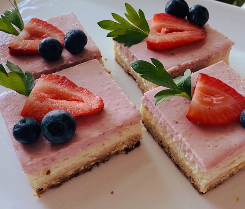 Fresh strawberry cheesecake bars at Chic Sweets Bakery in Houston – scratch-made with real butter and natural ingredients.