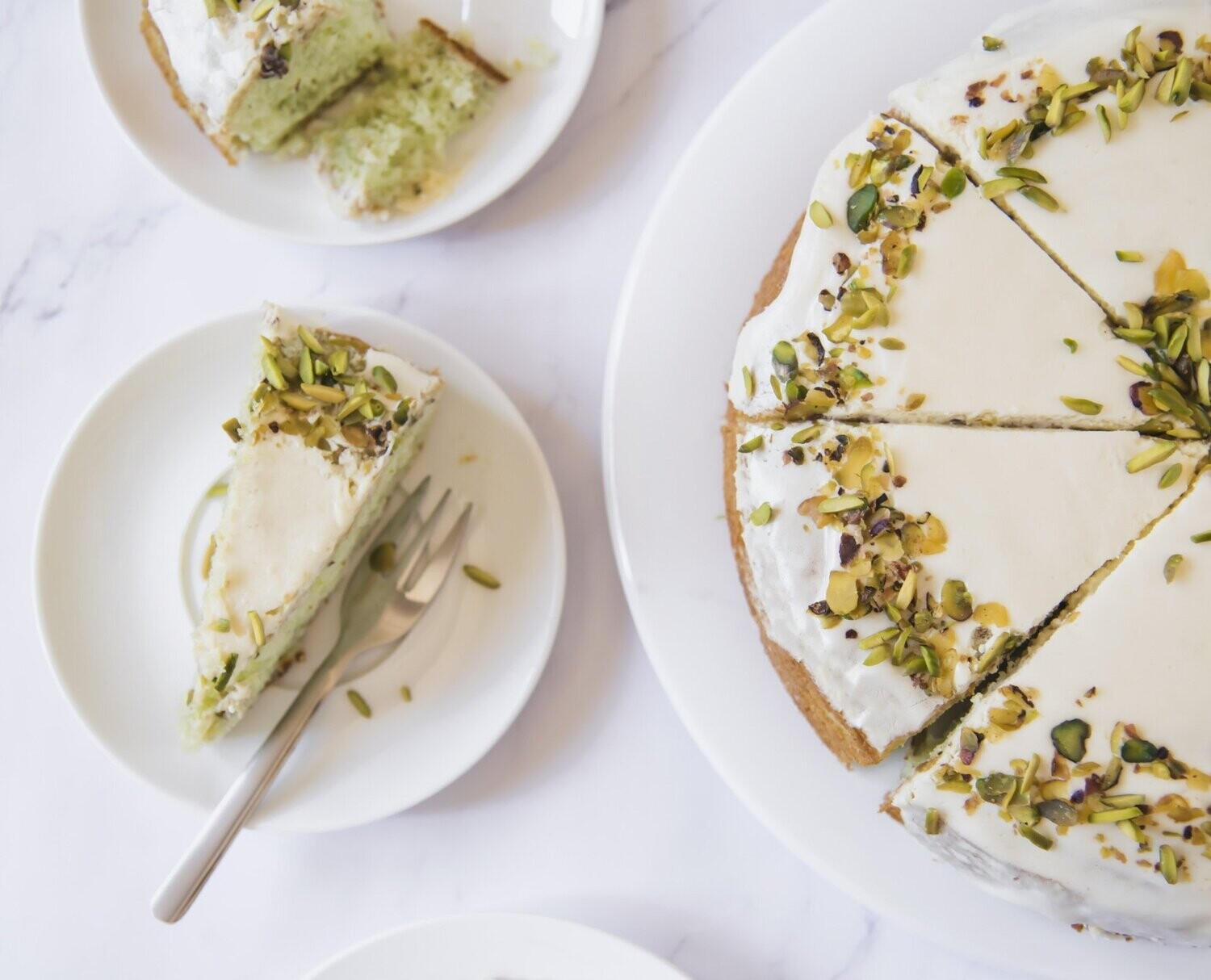 Fresh pistachio cake at Chic Sweets Bakery in Houston – scratch-made with real butter and natural ingredients.