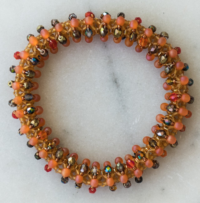 Stretch beaded bangle in orange tones &quot;Lucy&quot;