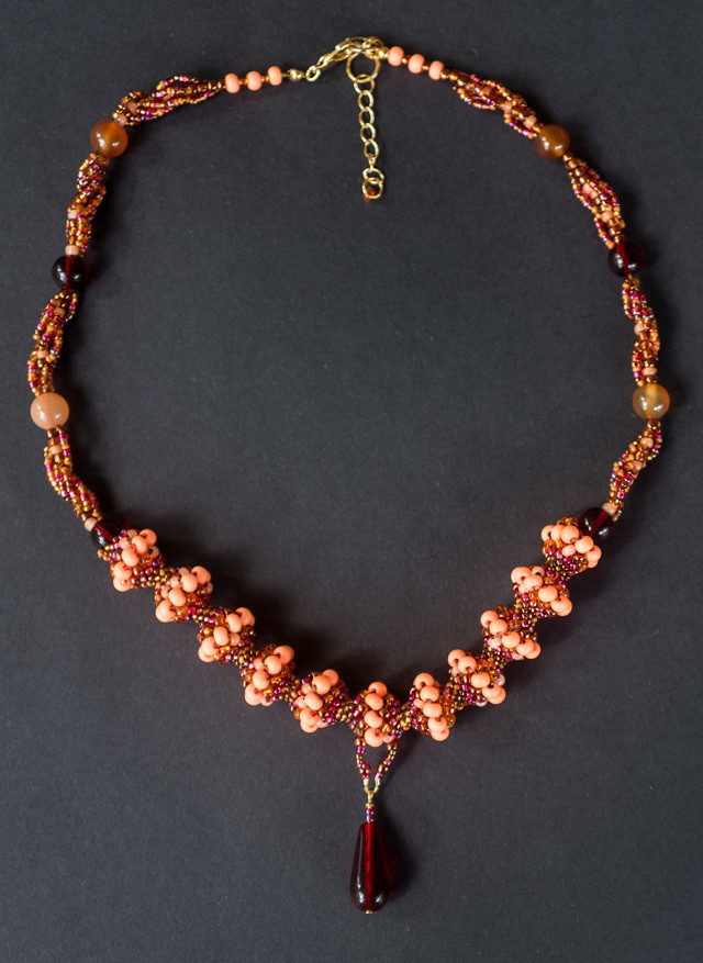 Orange twist necklace with lucite and carnelian features &quot;Rozanne&quot;