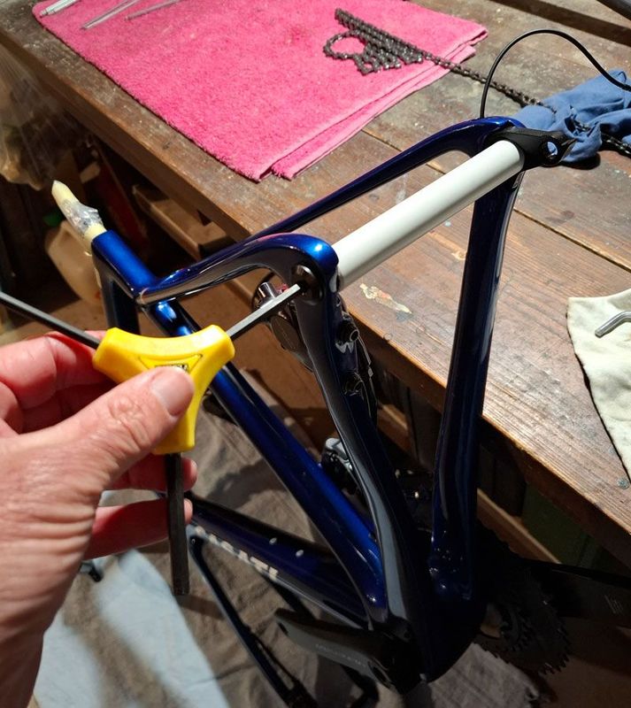 unscrew the thru axle
