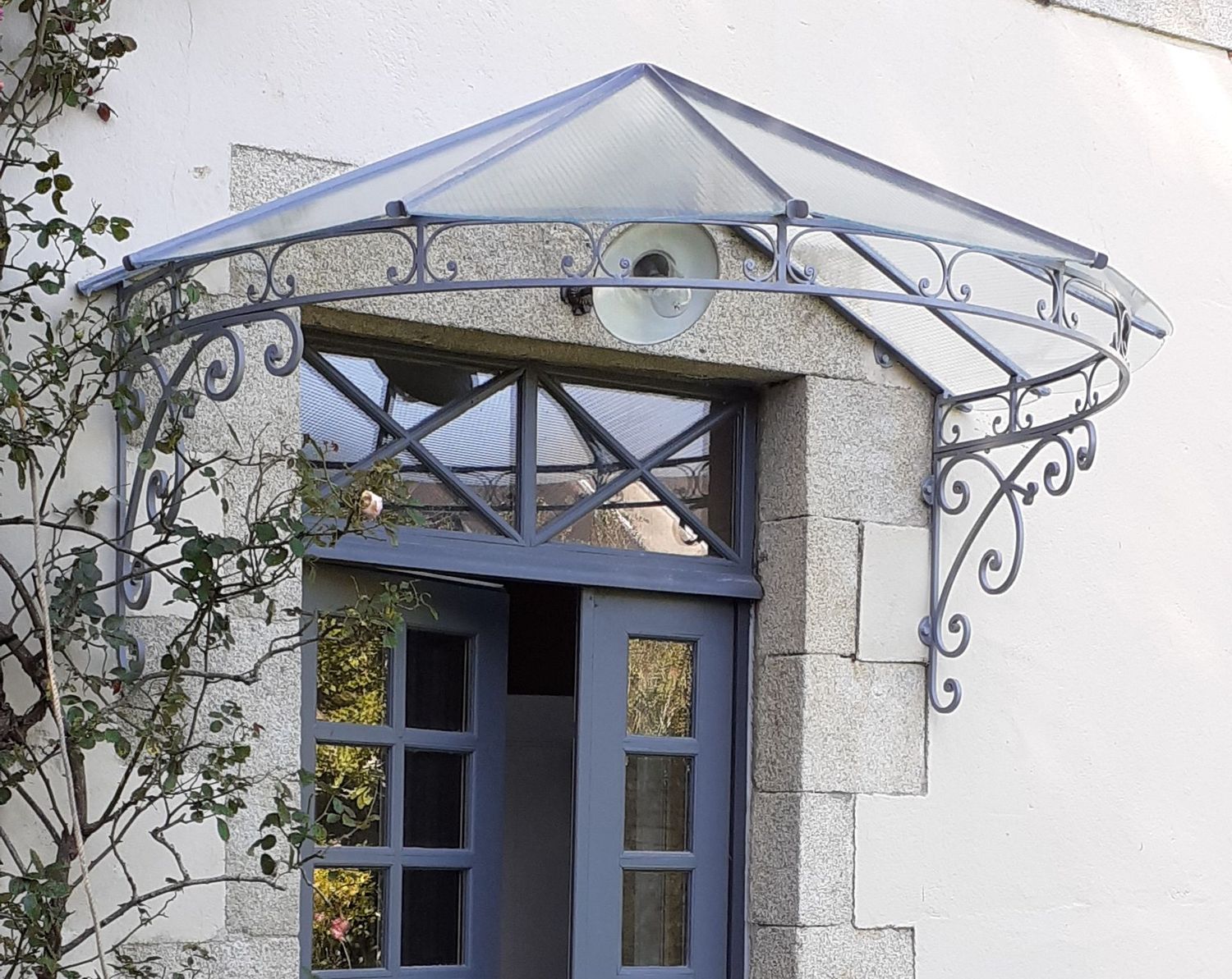 marquise éventail sur mesure ,210 cm entre potences et 60 cm entre la pointe et le bandeau