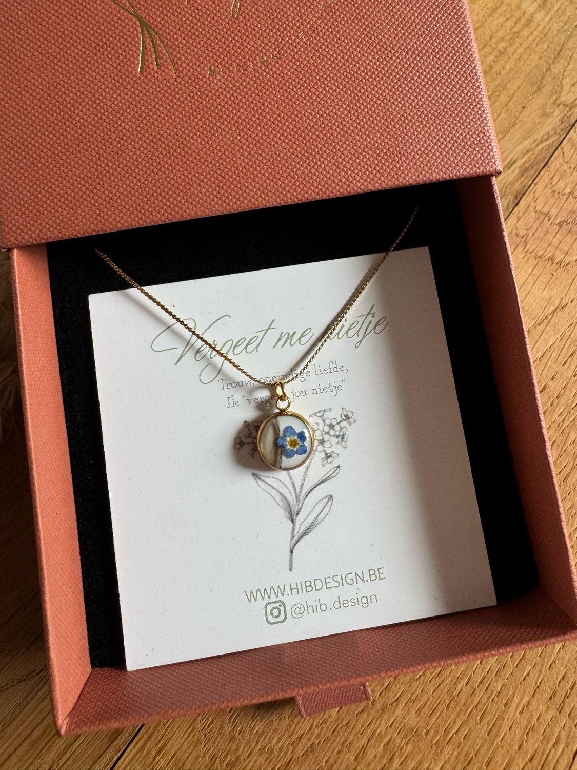 Ketting op maat: haren + vergeet me nietje