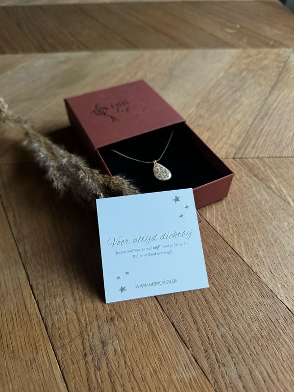 Asketting drop: goudvlokjes