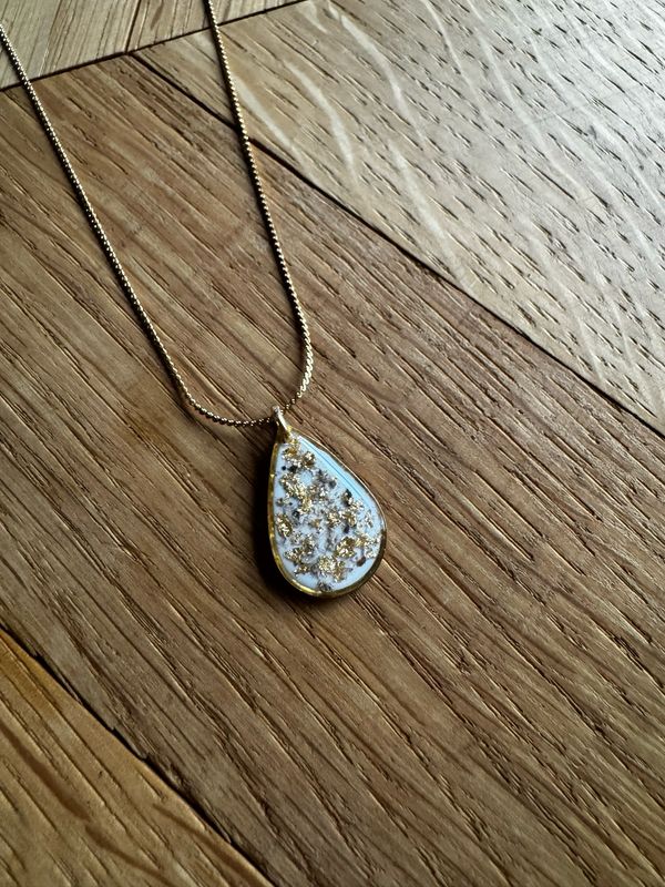 Asketting drop: goudvlokjes