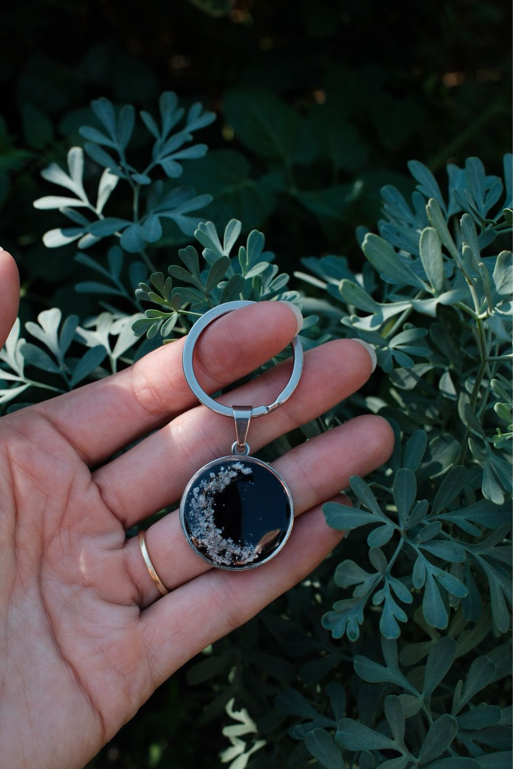 As sleutelhanger: zilver