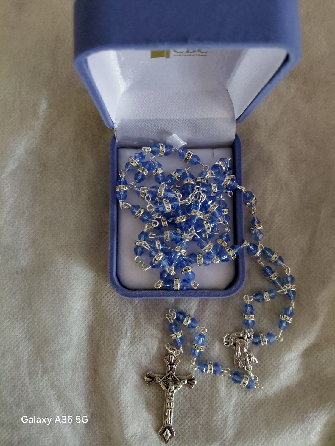 Blue Glass Rosary with Crystal Ring.