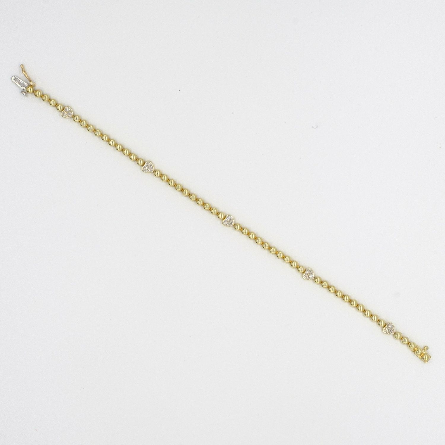 9ct yellow gold bead and white gold diamond set heart design bracelet