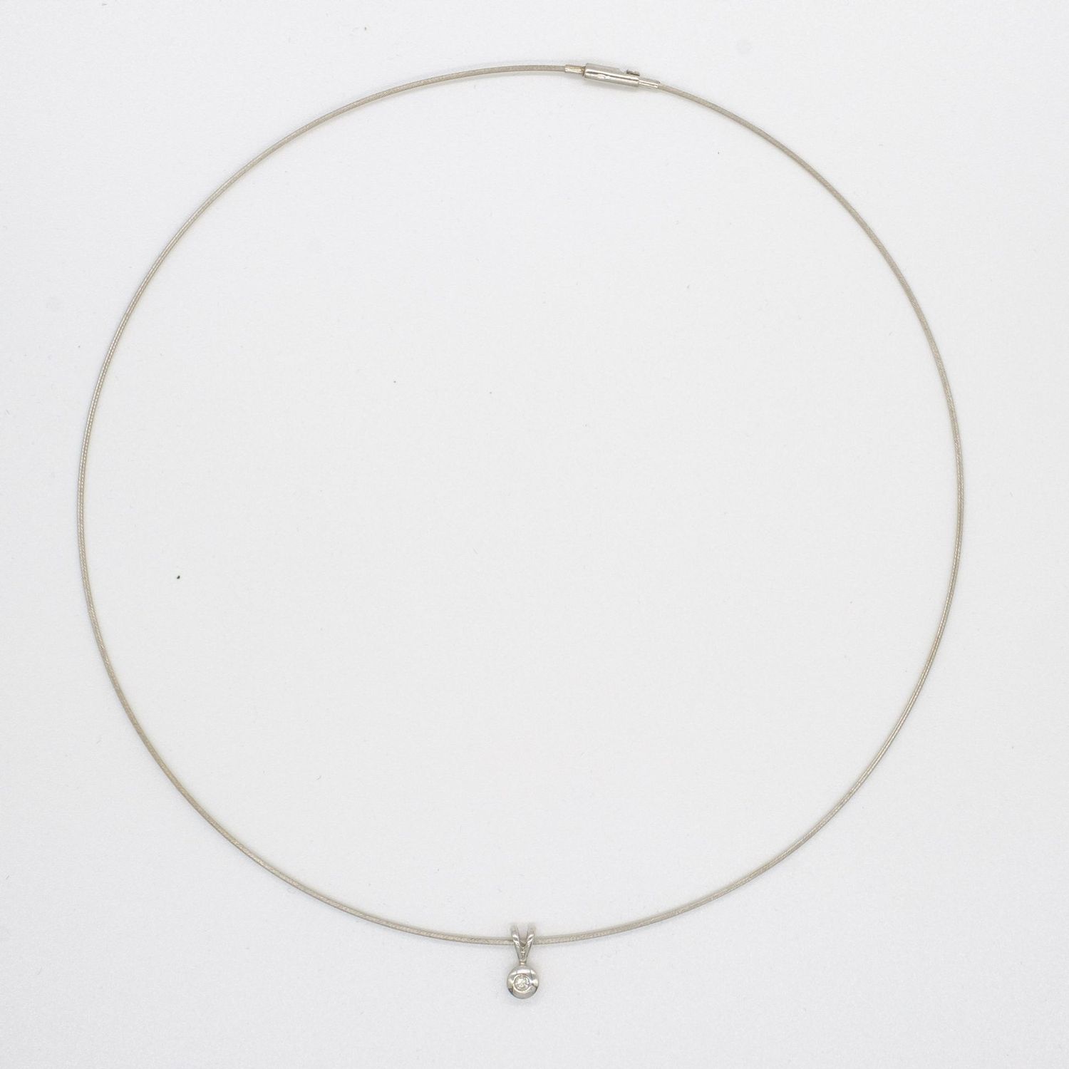 9ct White Gold Diamond Pendant on a 9ct White Gold Wire Necklet