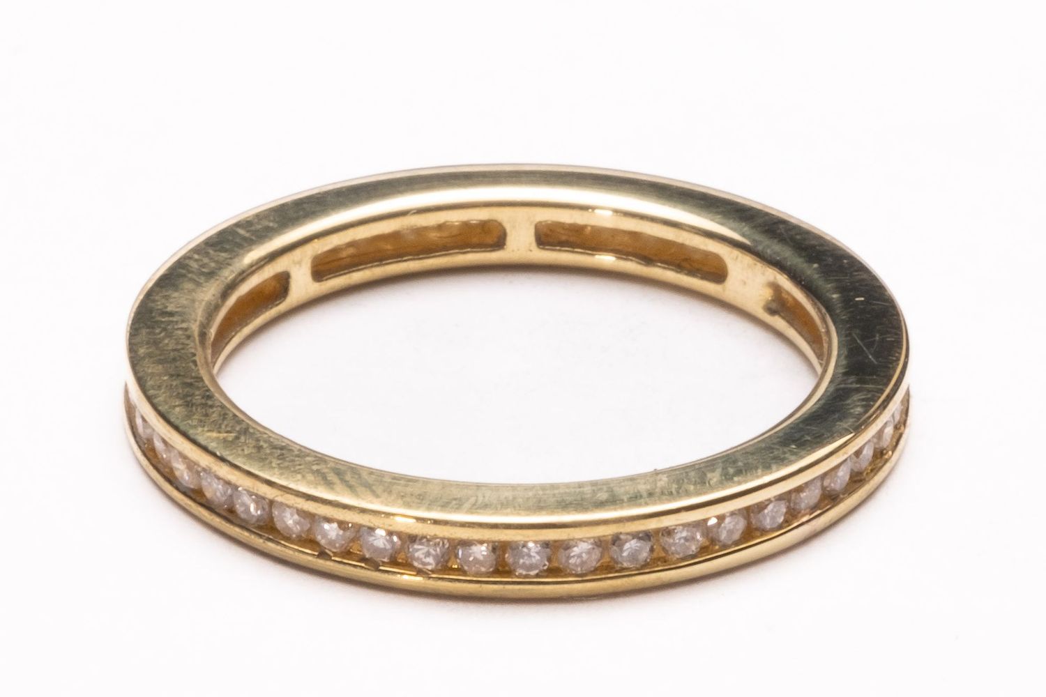 Diamond channel set full eternity 18ct yellow gold ring