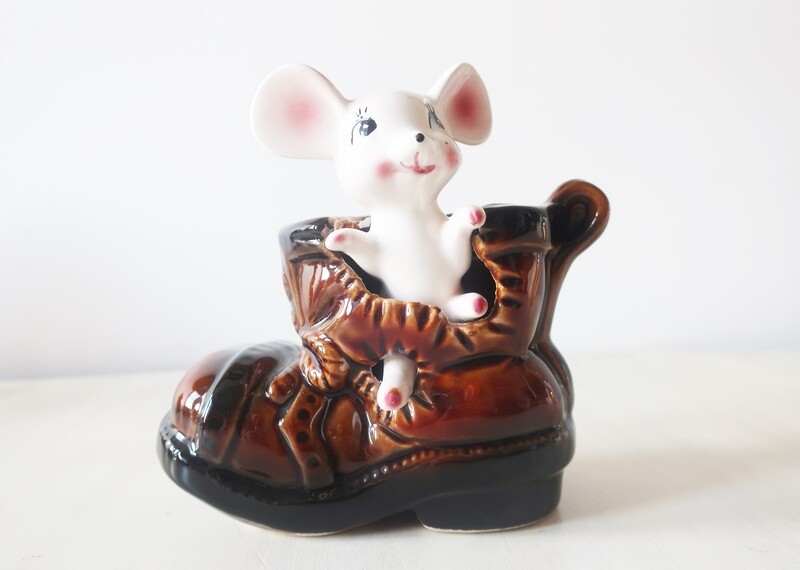 Cute mouse in boot money box