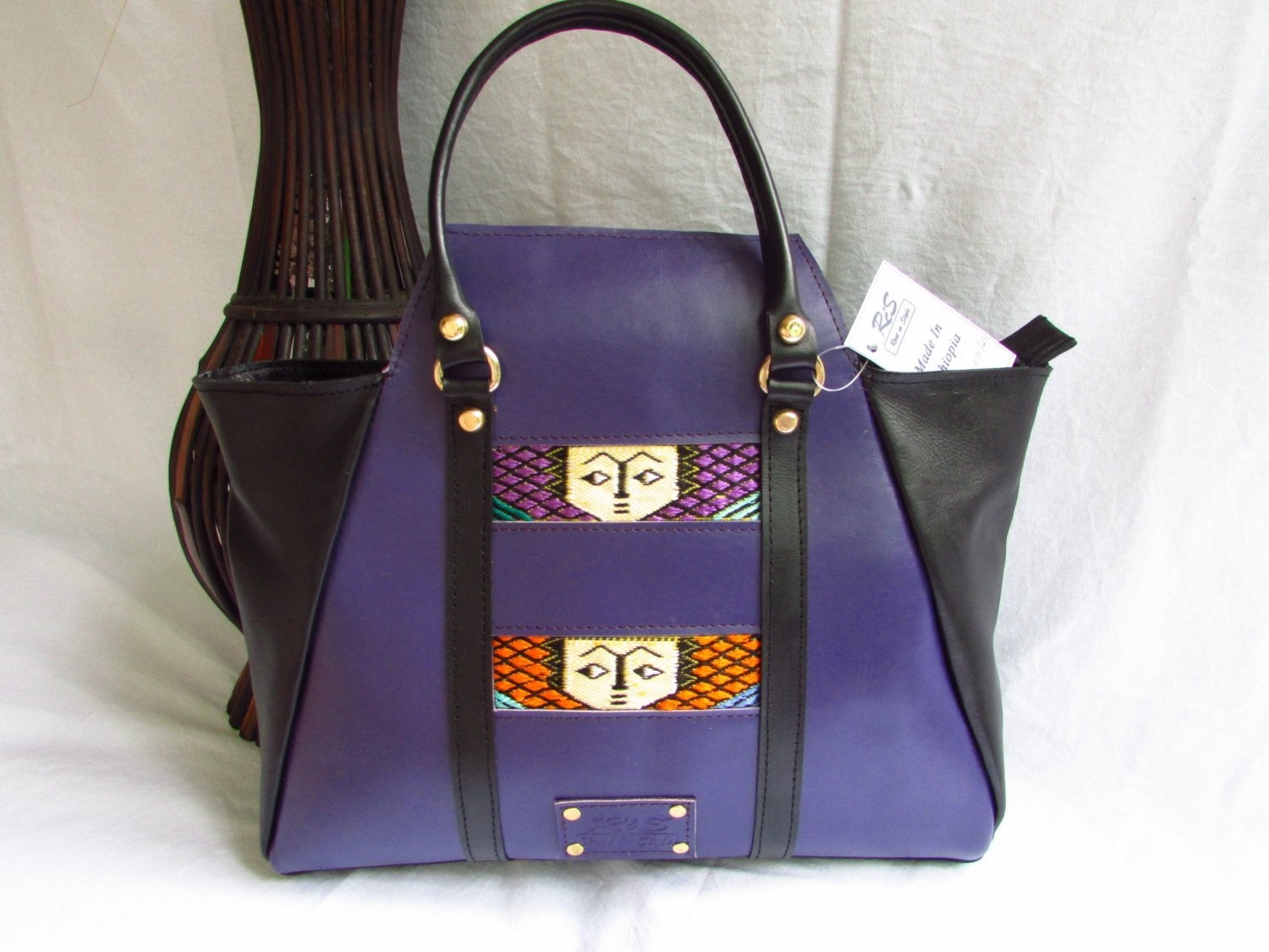 Purple leather handbag for women