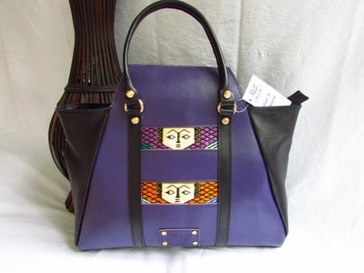 Purple leather handbag for women
