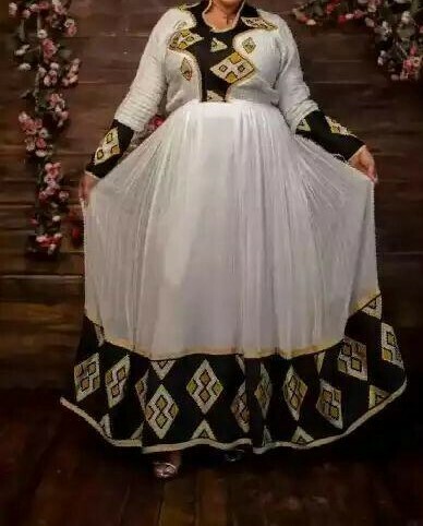 ረዘም ያለ የሀበሻ ቀሚስ  Ethiopian Traditional Long Dress