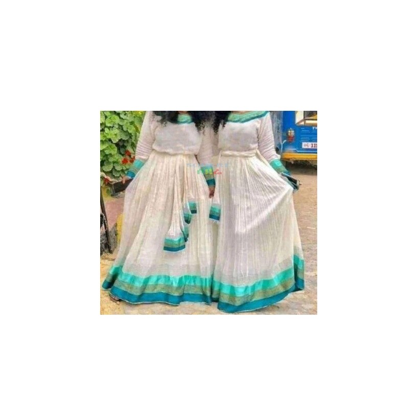 ረዘም ያለ የሀበሻ ቀሚስ  Ethiopian Traditional Long Dress