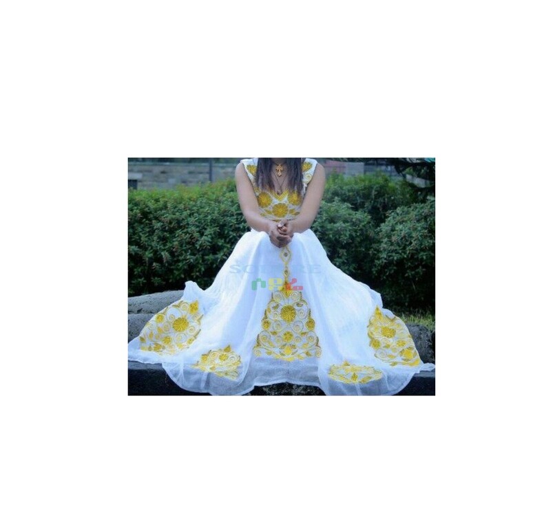 ረዘም ያለ የሀበሻ ቀሚስ  Ethiopian Traditional Long Dress