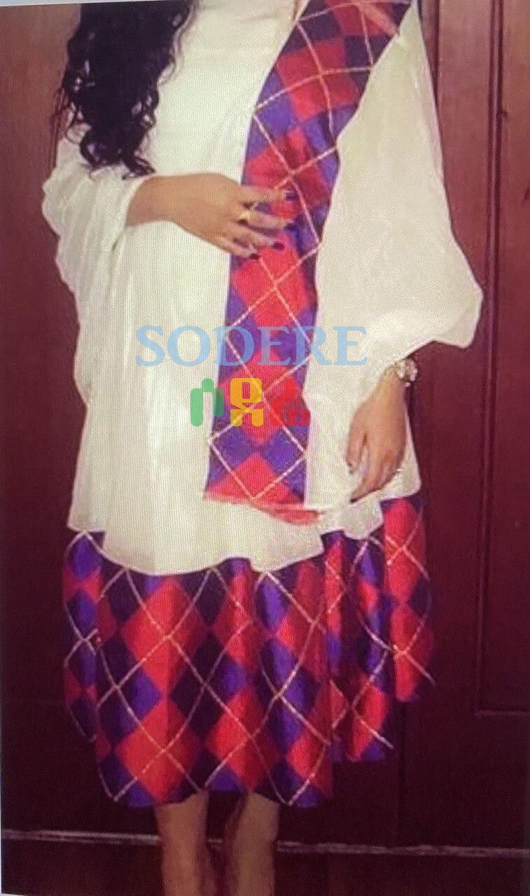 በእጅ የተጠለፈ ረዘም ያለ የሀበሻ ቀሚስ  Ethiopian Traditional Long Dress