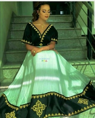 ረዘም ያለ የሀበሻ ቀሚስ  Ethiopian Traditional Long Dress