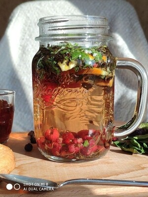 Glass drinking jar with straw