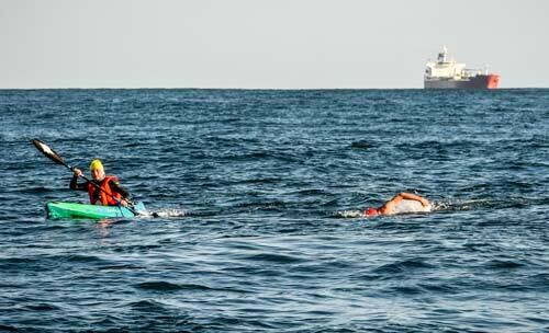 Swimming with a kayaker