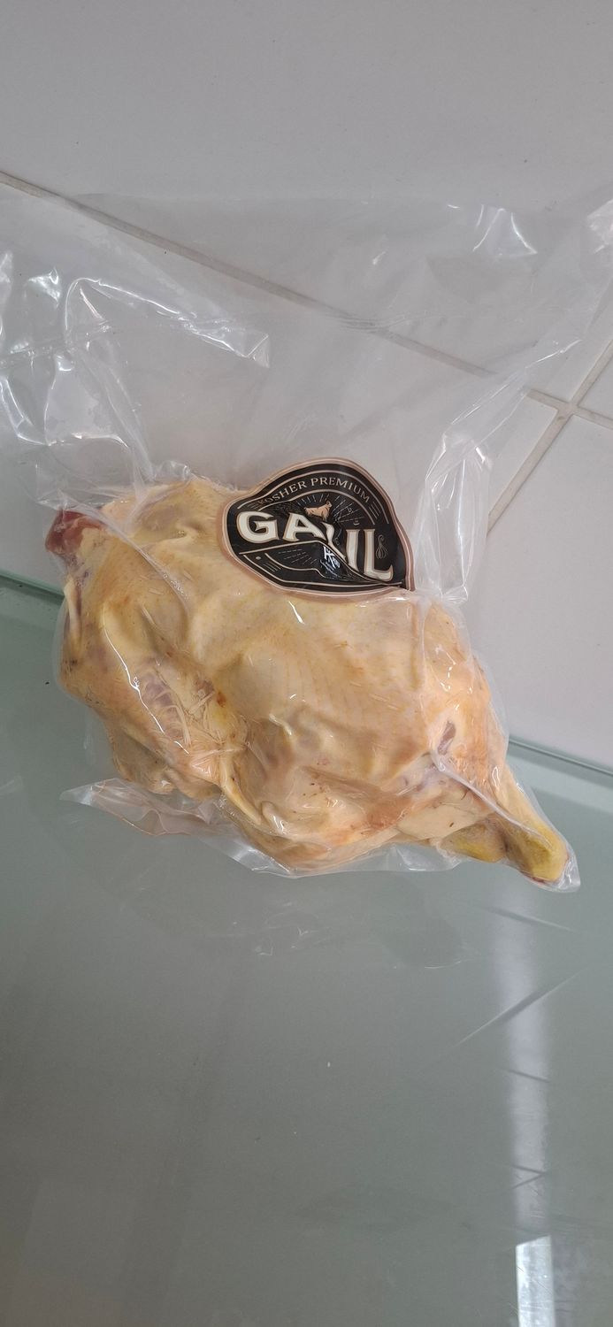 Pollo entero con piel