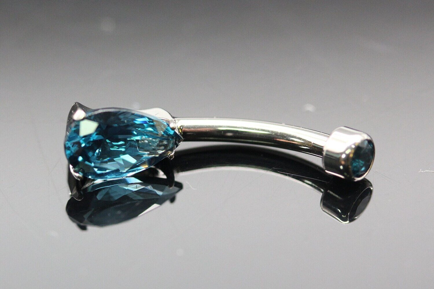 Anatometal Titanium Pear shaped Navel Curve with London Blue Stones with 5x8mm Pear stone