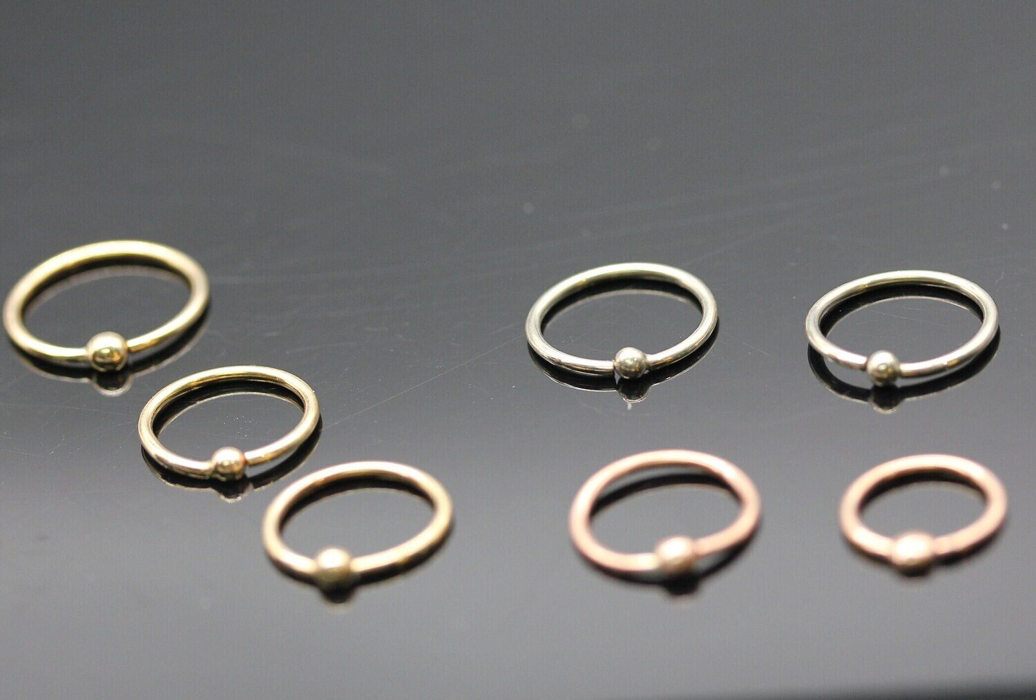 14k solid Gold (NOT plated or filled)Fixed Ball Captain Bead Ring
