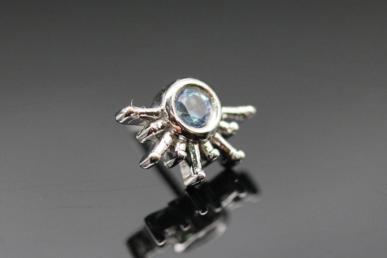 BVLA White gold pin Live to Tell with polar Sapphire