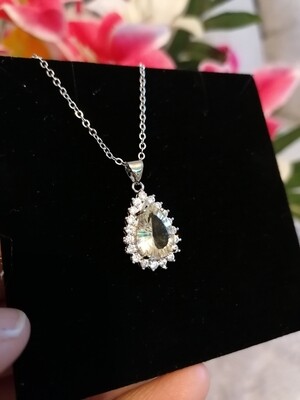 Citrine peardrop pendant with zircon crystals Citrine peardrop pendant with zircon crystals