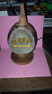 Coconut shell designer pleasing off white colourLED Lighting with Thenkalai Thirumann