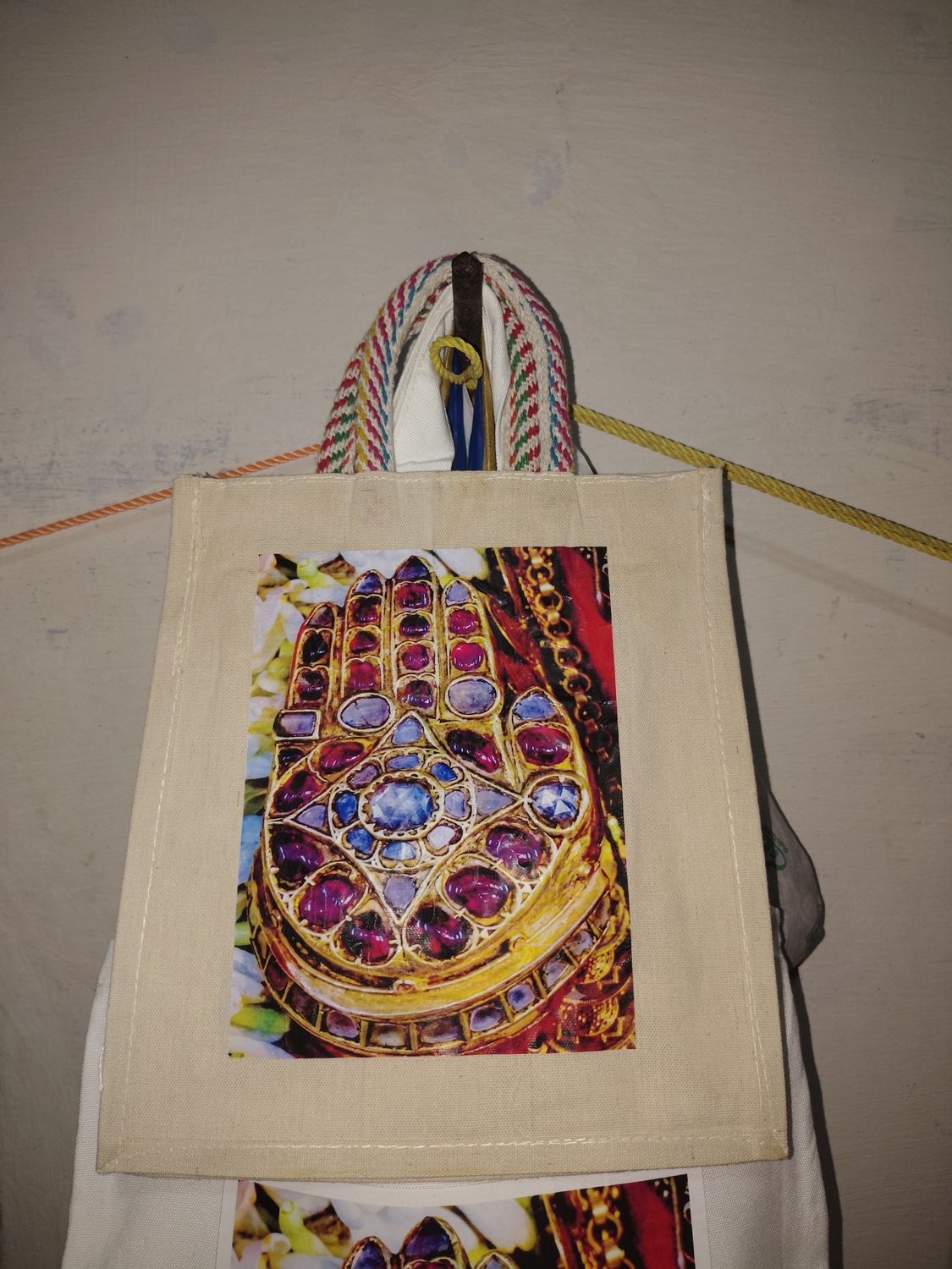 White jute Bag 12x8 hxw inches with thick handles and Lord Ranganatha Abhayahatham image on single side only White jute Bag 12x8 hxw inches with thick handles and Lord Ranganatha Abhayahatham image on single side only