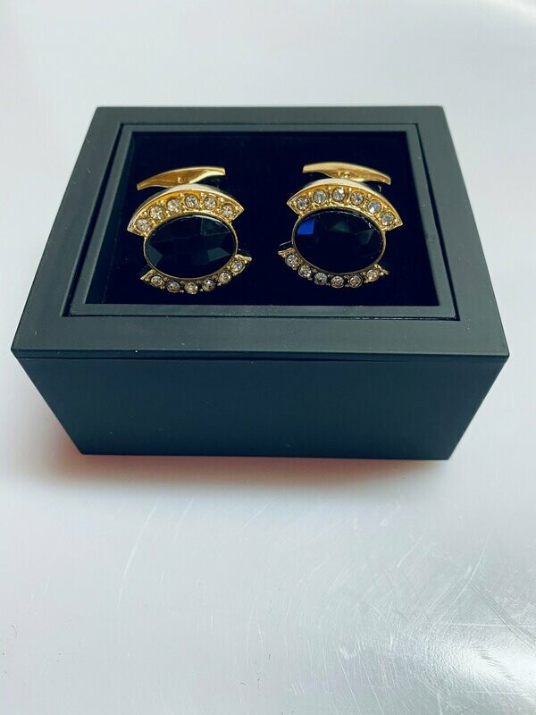 Gold cufflinks