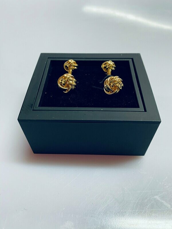 Gold cufflinks