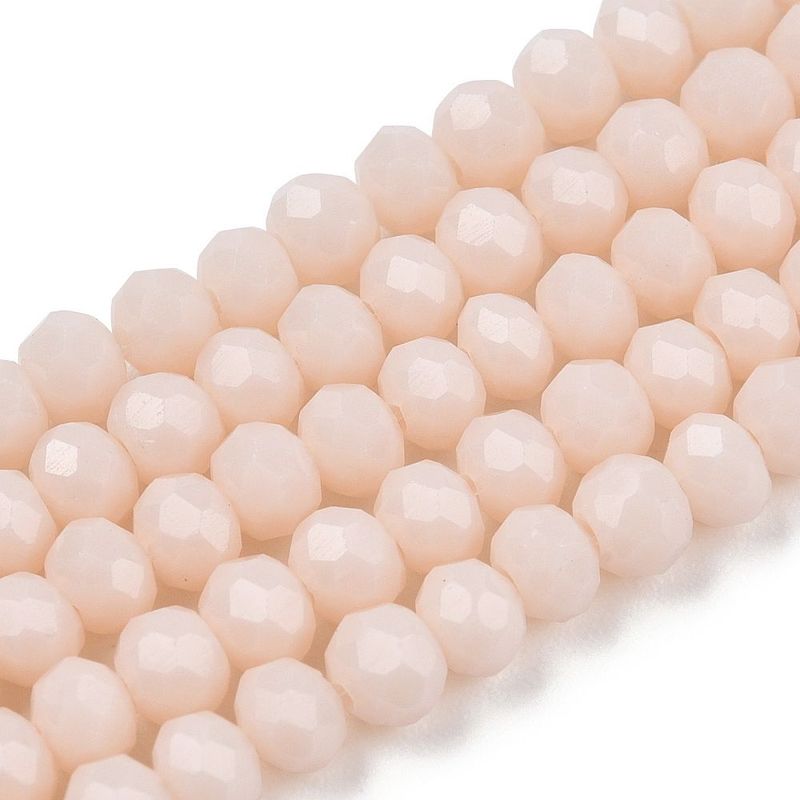 8x6mm Faceted Glass Rondelles in Pale Peach 8x6mm Faceted Glass Rondelles in Pale Peach