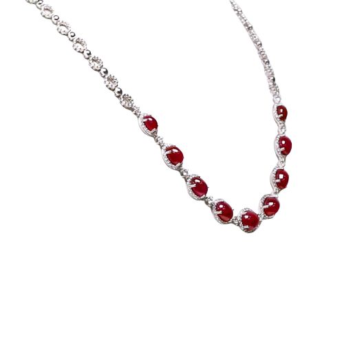 A 19.48 Ct. Ruby and Diamond Necklace, 18K White Gold. The necklace primarily features with 9 red oval shaped cabochon cut rubies. 209 round diamonds 1.86 ctw vs2 grade