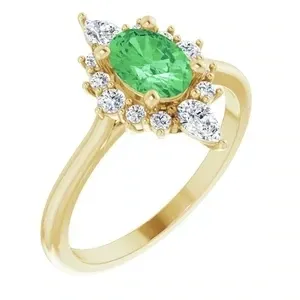 14K Yellow 7x5 mm Oval AA Tsavorite Garnet with1/3 CTW Diamond accents Halo-Style ring. Diamonds are Clarity, Color SI2-SI3, GHI, G-H :: 3/8 CTW​
