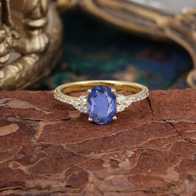 1.5 Carat Classic Vintage 4-Prong Oval Cut Tanzanite and Diamond Ring