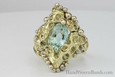 Aquamarine Uniquely Set in Coral and our Swirl  Ring