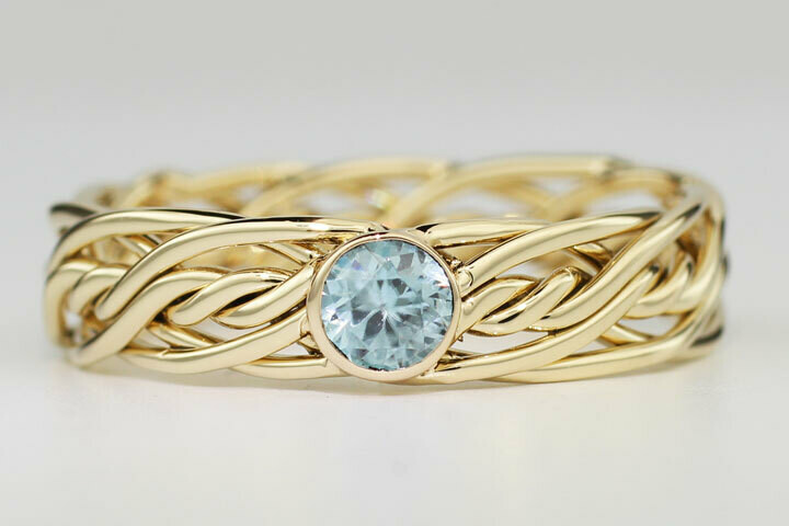 Seven Strand Ring with a Bezel Set Aquamarine