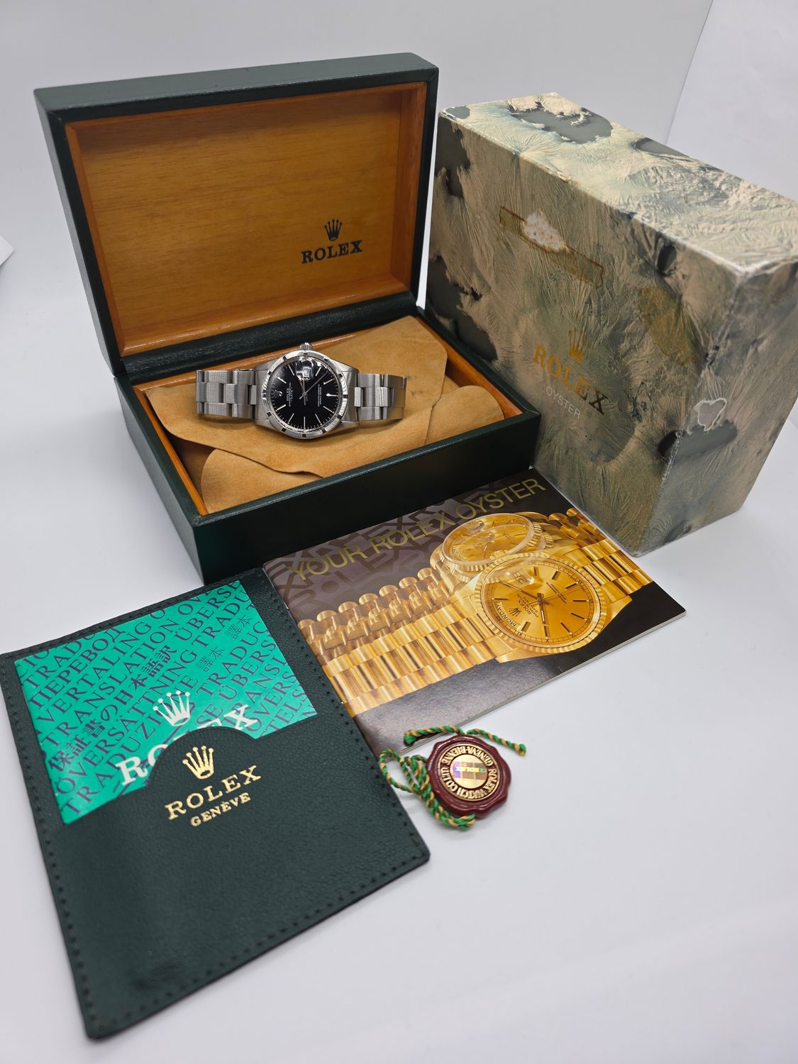 Rolex Oyster Perpetual Date 15010 - Rare Black 'Error' Dial - Box &amp; Booklets