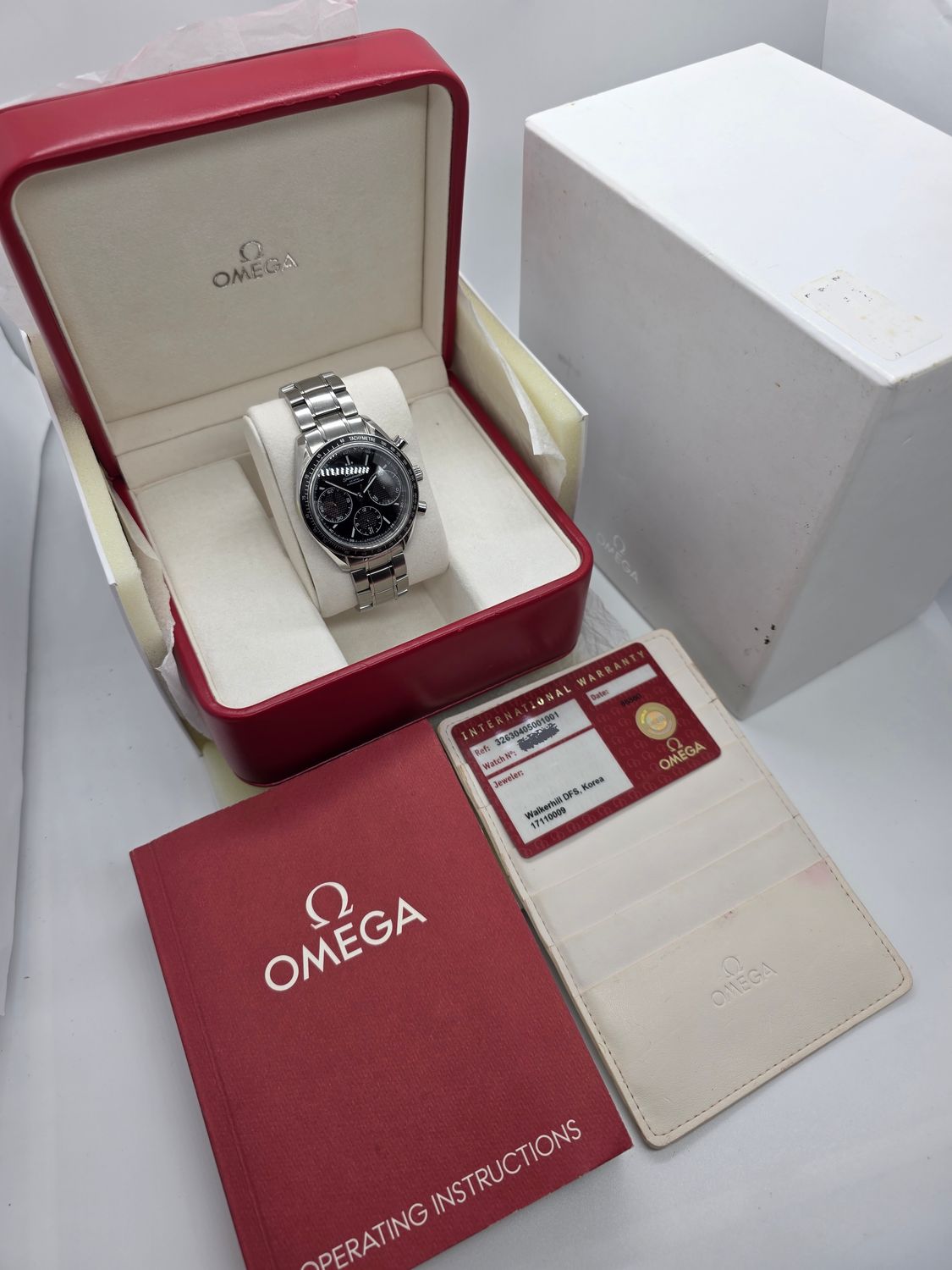 OMEGA Speedmaster Racing Black Watch - 326.30.40.50.01.001, Box &amp; Papers